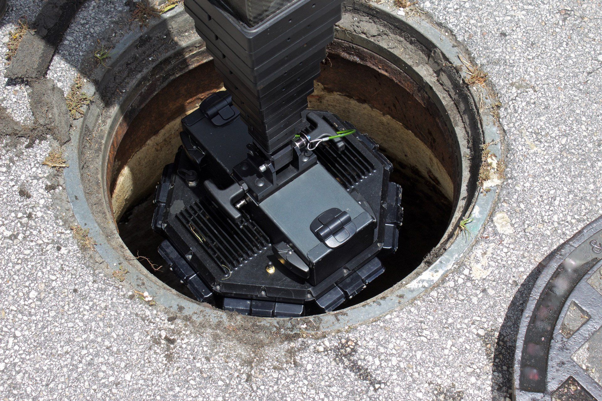 Sewer scope and camera entering sewer