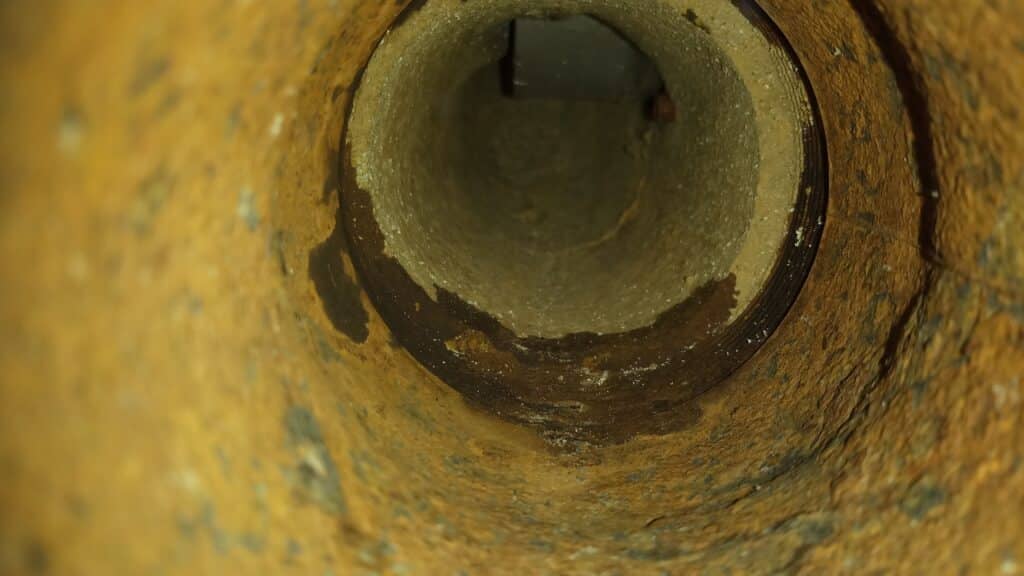 Interior of rusted steel sewer pipe
