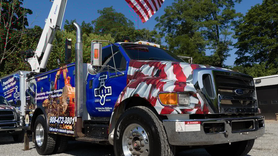 Arrow truck with flag